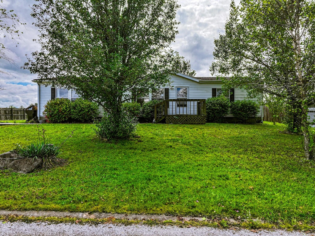 view of yard with a deck