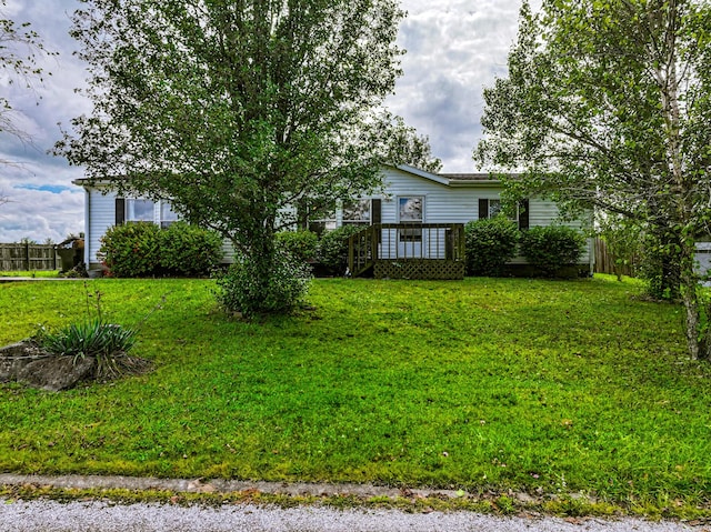 view of yard with a deck