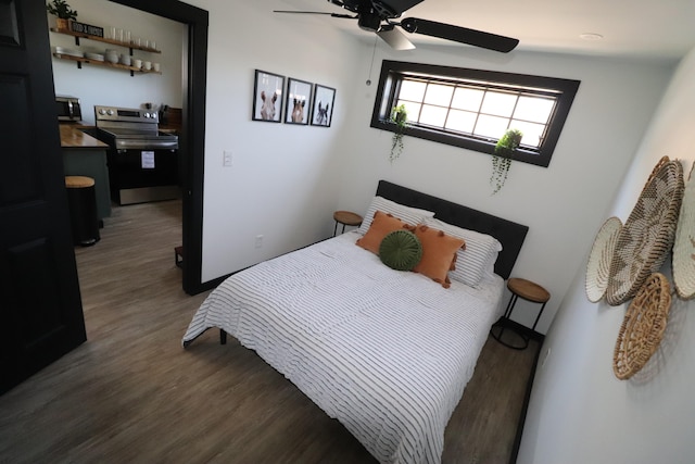 bedroom with ceiling fan and dark hardwood / wood-style floors