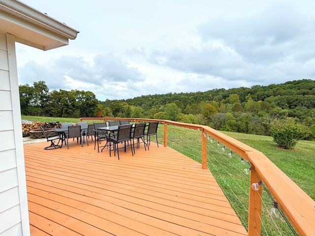 deck featuring a yard