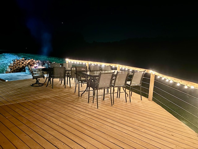 view of deck at twilight