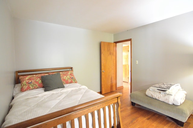 bedroom featuring wood-type flooring