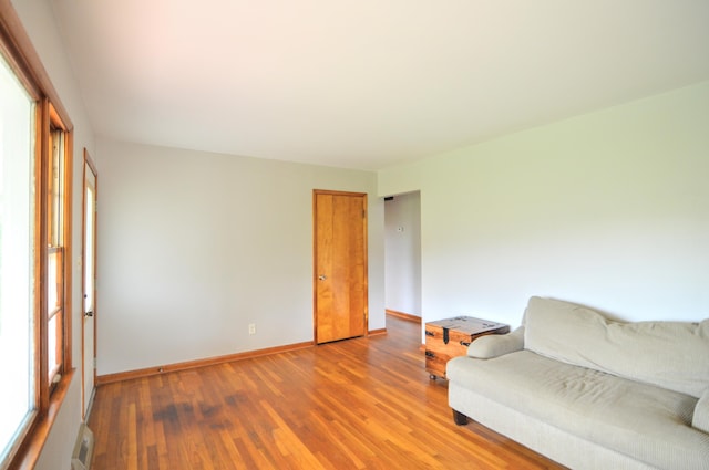 unfurnished room with hardwood / wood-style floors