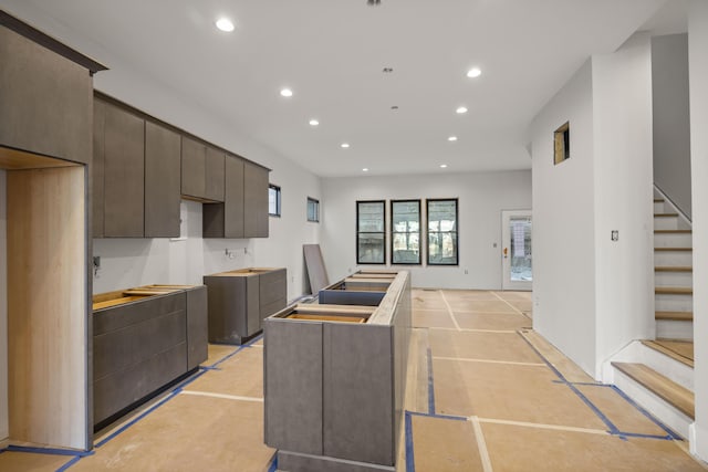 kitchen featuring dark brown cabinetry