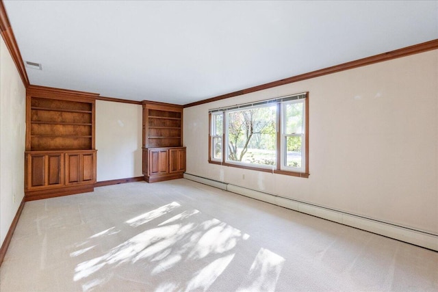 unfurnished living room with built in shelves, ornamental molding, baseboard heating, and light carpet