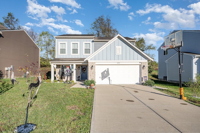 view of front of home featuring a garage and a front lawn