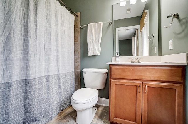 bathroom featuring hardwood / wood-style floors, vanity, a shower with shower curtain, and toilet