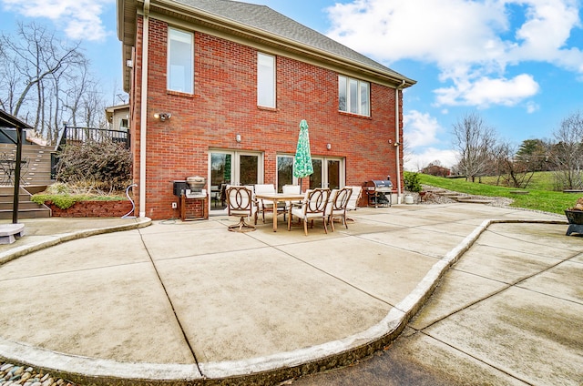 back of house with a patio area