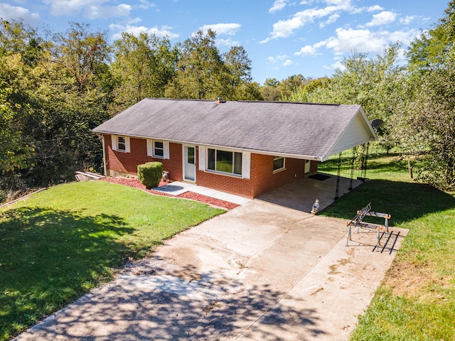 single story home with a front yard and a carport