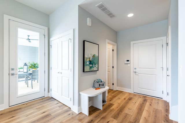 entryway with light hardwood / wood-style flooring