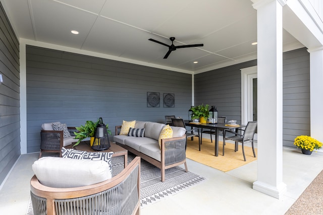 view of patio with an outdoor living space and ceiling fan