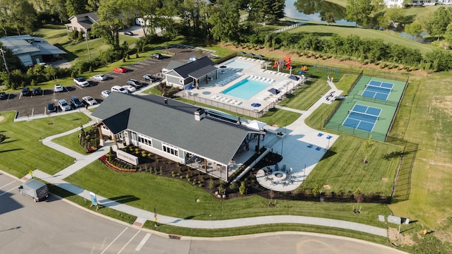 birds eye view of property featuring a water view