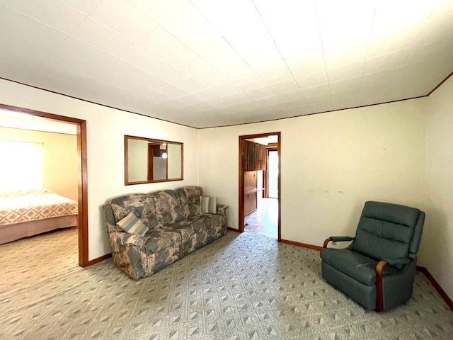 living area featuring light colored carpet