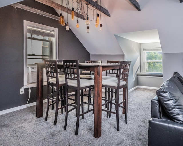 dining space featuring vaulted ceiling with beams and carpet