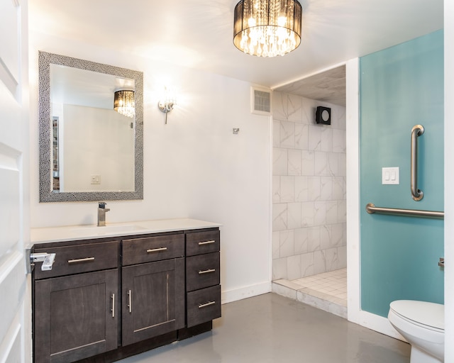 full bath featuring a walk in shower, toilet, vanity, baseboards, and visible vents