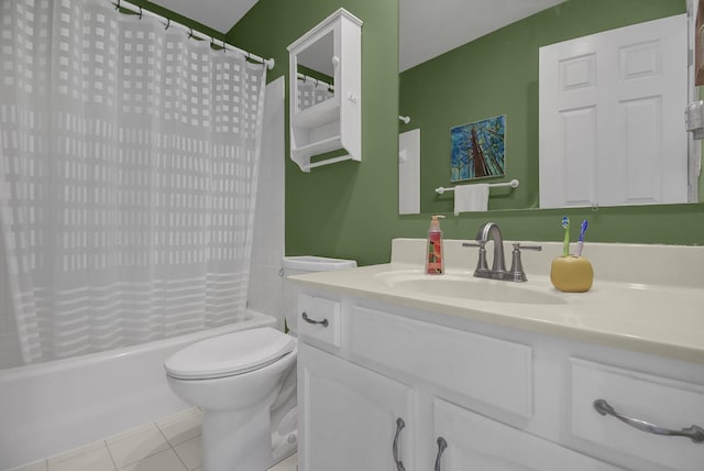 bathroom with tile patterned floors, toilet, vanity, and shower / tub combo