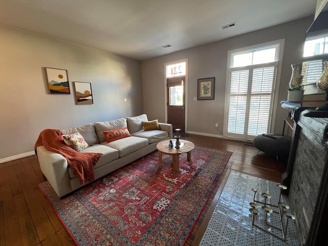 living room featuring dark hardwood / wood-style flooring