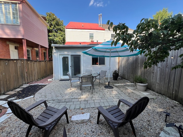 view of patio featuring french doors