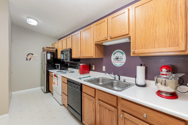 kitchen with black appliances and sink