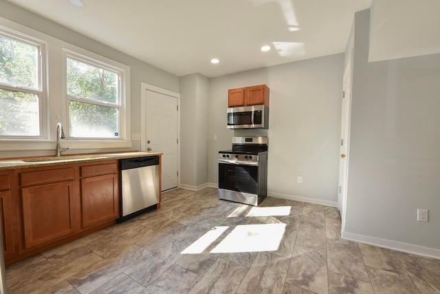 kitchen featuring stainless steel appliances and sink