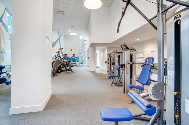 gym with carpet flooring and plenty of natural light