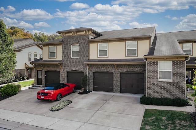 view of front of home with a garage