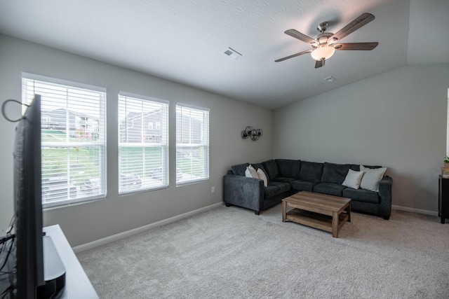 carpeted living room with lofted ceiling and ceiling fan