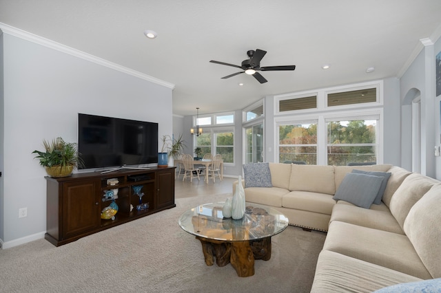 living room with light colored carpet, crown molding, and ceiling fan with notable chandelier