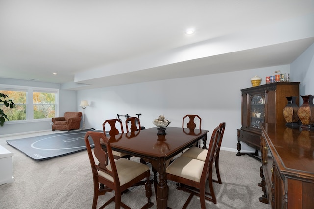 view of carpeted dining space