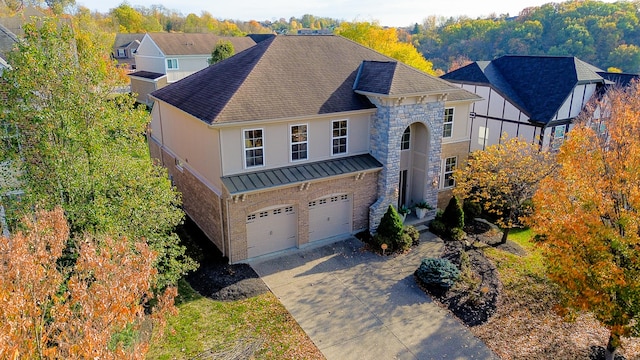 view of front of property with a garage