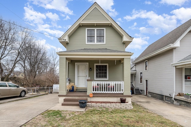 view of property with covered porch