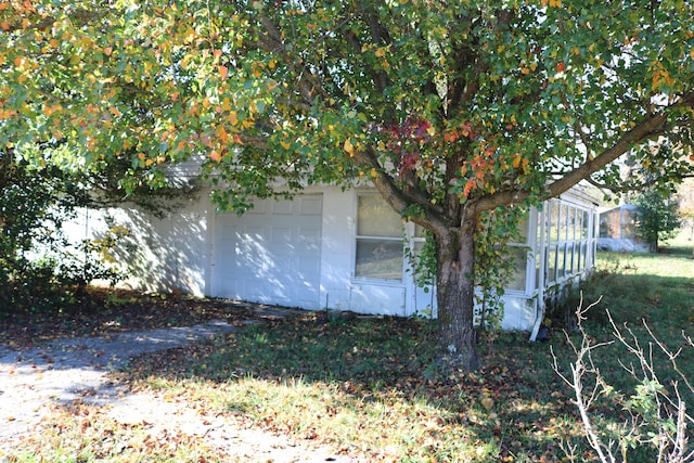 view of home's exterior with a garage