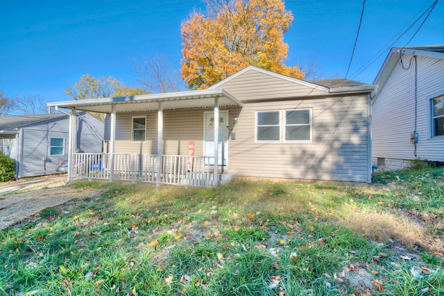 bungalow featuring covered porch