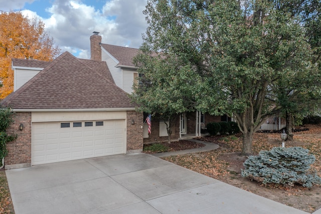 obstructed view of property featuring a garage