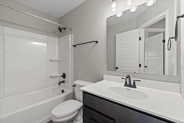 full bath featuring shower / bath combination, vanity, and toilet