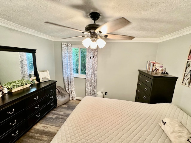 bedroom with ceiling fan, hardwood / wood-style floors, a textured ceiling, and ornamental molding