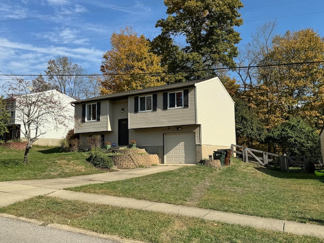 bi-level home with a front lawn and a garage