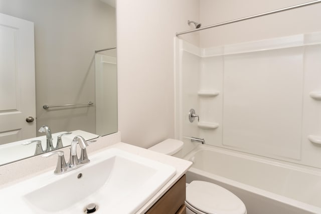 full bathroom featuring vanity, toilet, and bathtub / shower combination