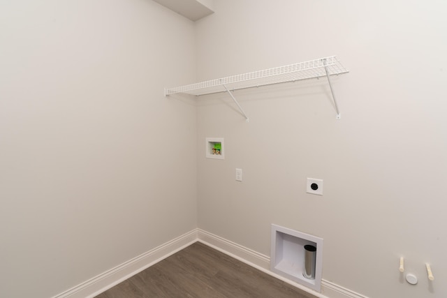 laundry room featuring hookup for an electric dryer, dark hardwood / wood-style flooring, gas dryer hookup, and hookup for a washing machine