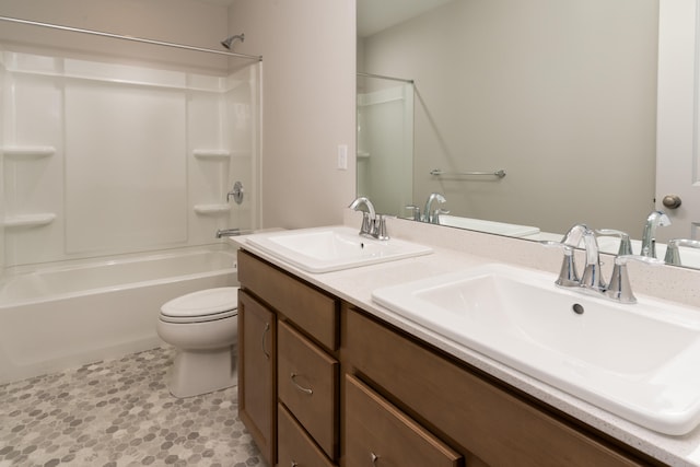 full bathroom with toilet, bathtub / shower combination, and vanity