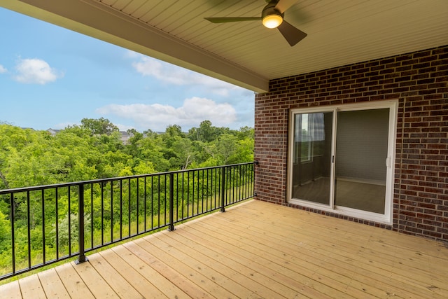 wooden terrace featuring ceiling fan