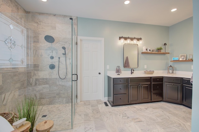 bathroom with vanity and an enclosed shower