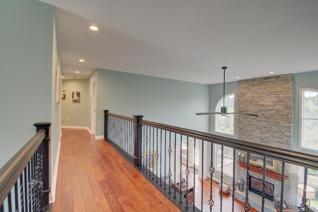 hallway with wood-type flooring