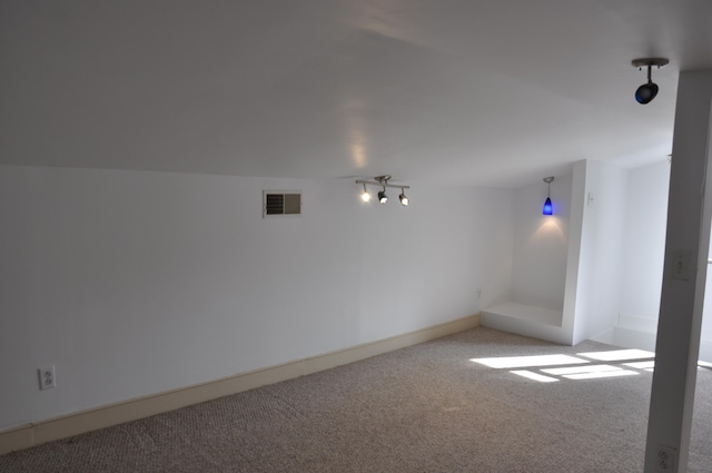 spare room featuring carpet flooring