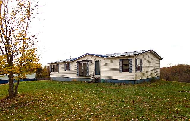 view of front of home with a front lawn