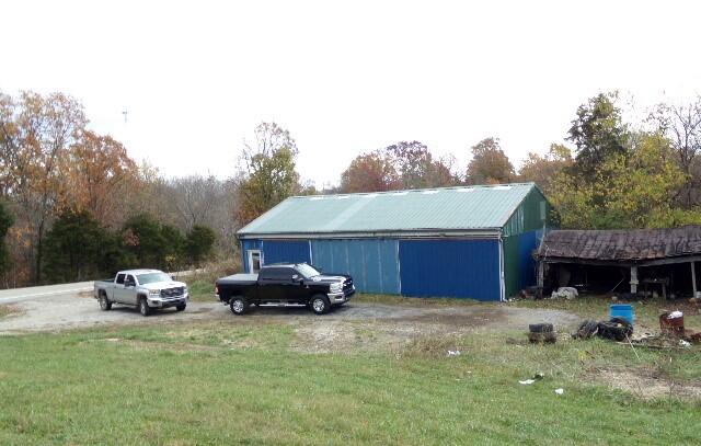 view of outdoor structure with a yard