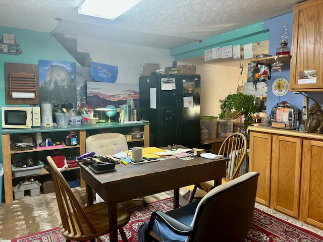 interior space with a textured ceiling