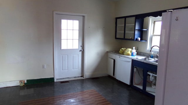 kitchen featuring white cabinetry, dishwasher, dark wood-type flooring, and sink