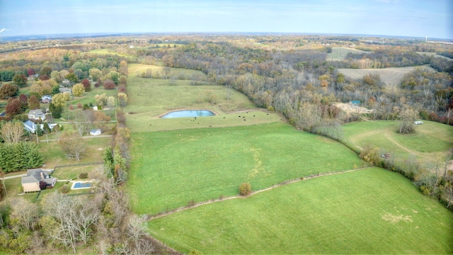 aerial view featuring a water view and a rural view