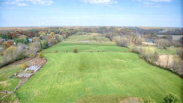 birds eye view of property featuring a rural view